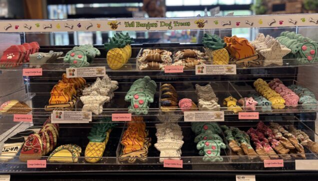 Display case of frosted dog treats at Stone Mountain Pet Lodge near Osseo, MN.